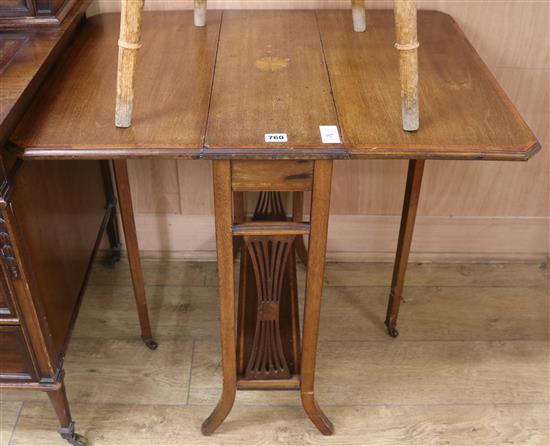 An Edwardian mahogany sutherland table,